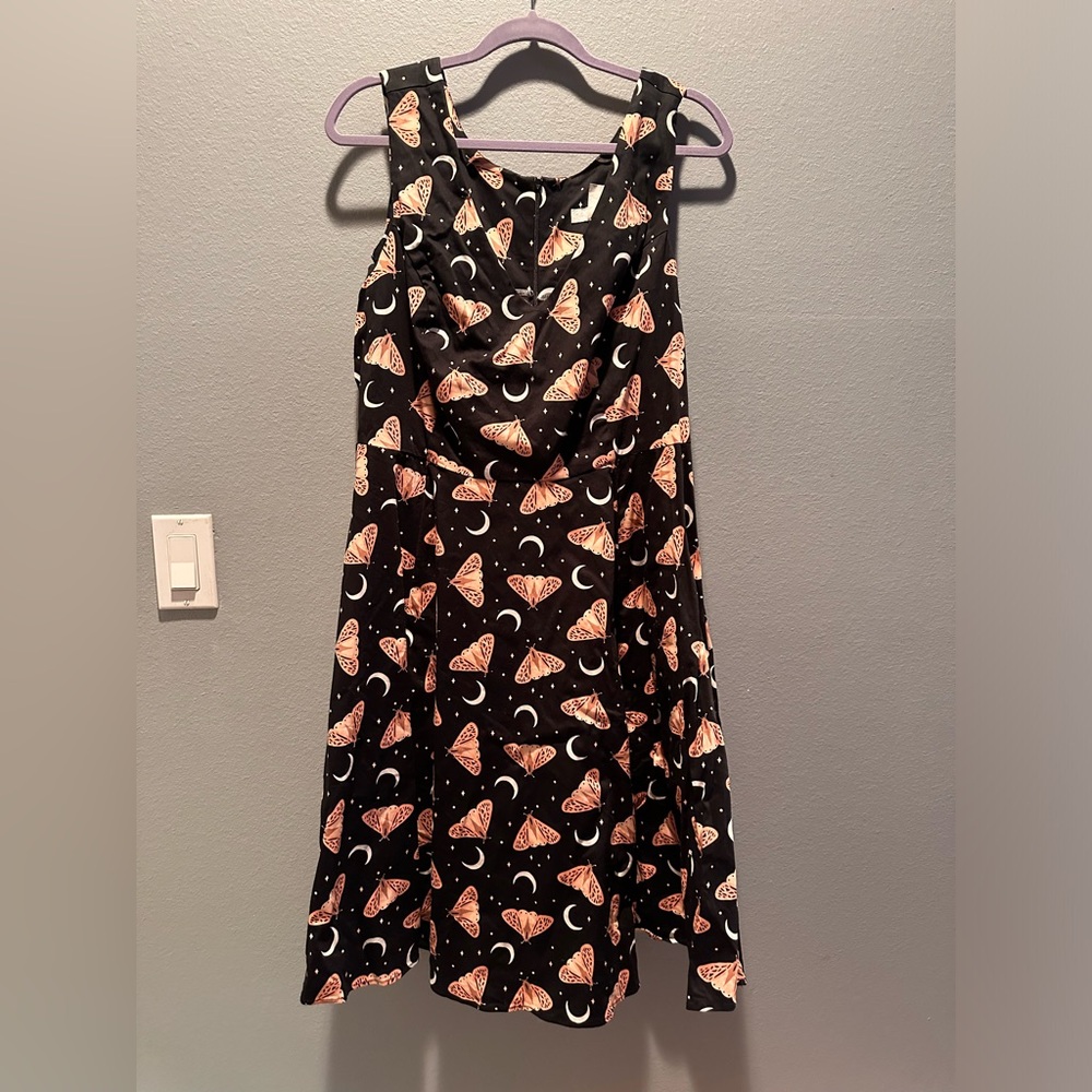 Eva Rose pink moth dress.